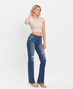 The Erika High Rise Raw Hem Bootcut Jean